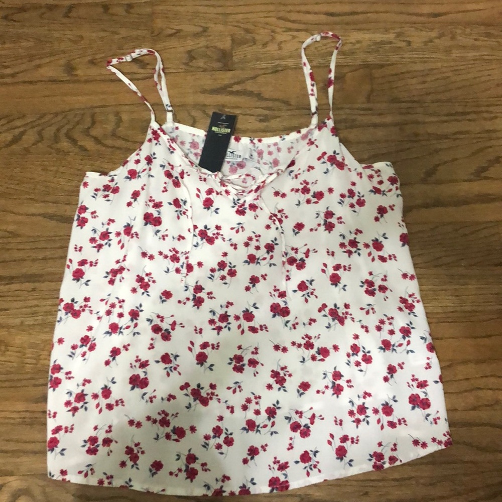 White tank with red floral design